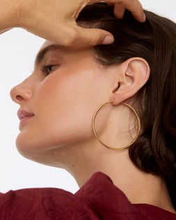 Janis Shiny Gold Tone Waterproof Large Hoop Earrings